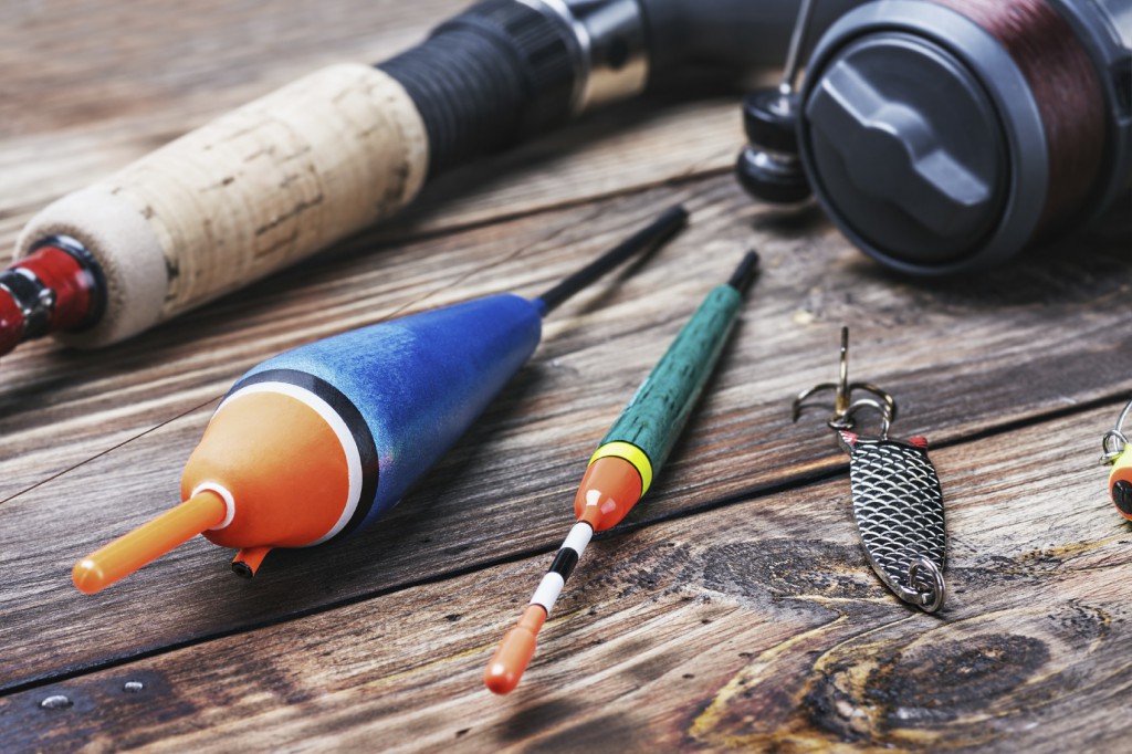 fishing tackle on a wooden table