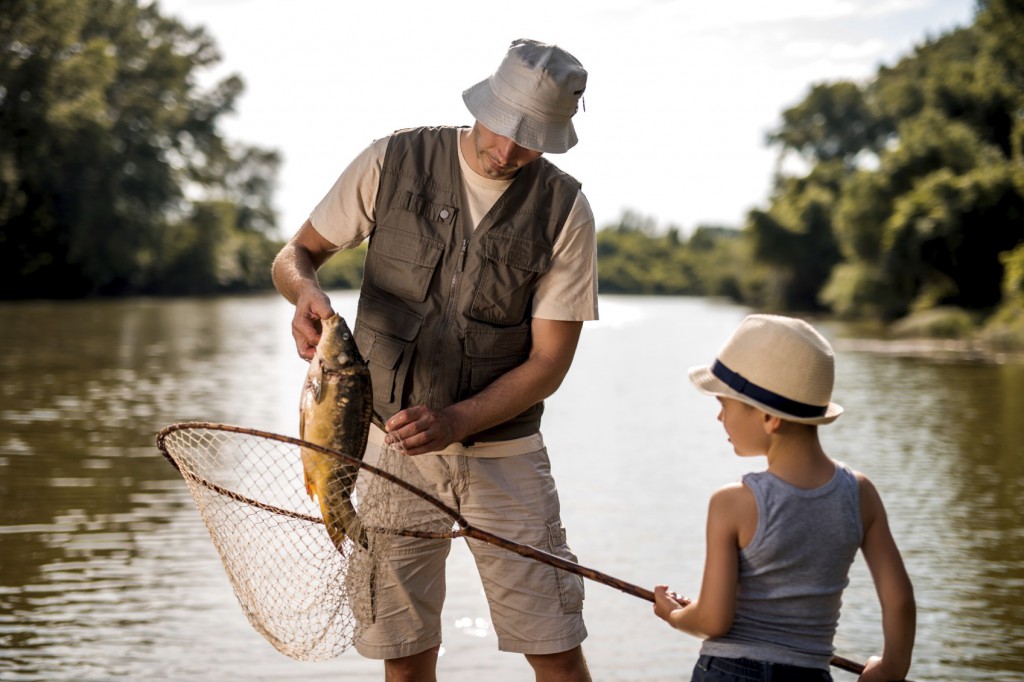father and son summer fishing