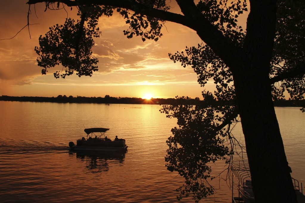 pontoon boat at sunset