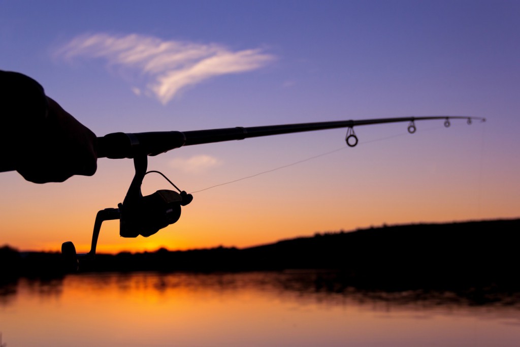 fishing at sunset